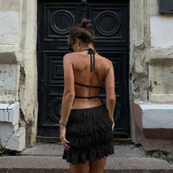 Conjunto Priya: top para atar e saia plissada
